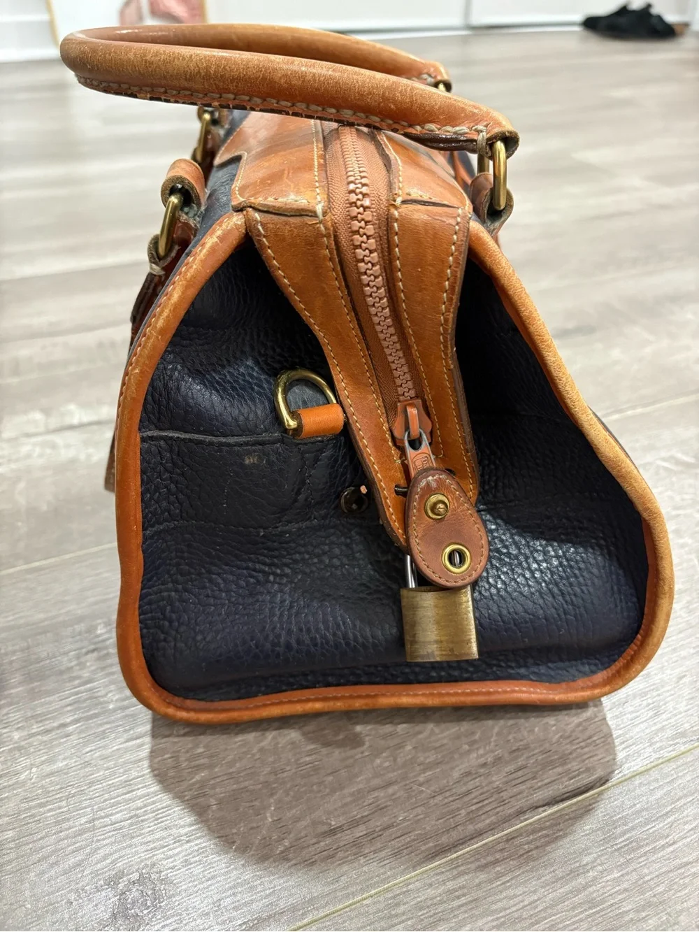 Dooney & Bourke Navy and Tan Pebbled Leather Doctor Bag